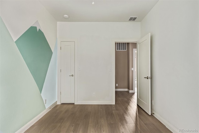 1928 W 67th Pl, Denver, CO 80221 - empty room with wood finished floors and a smoke detector