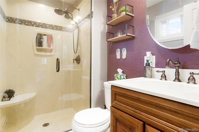 8595 S Yarrow St, Littleton, CO 80128 - bathroom featuring a stall shower and vanity