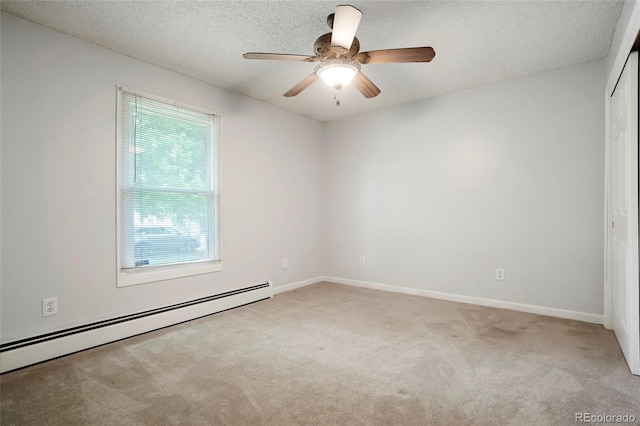 8595 S Yarrow St, Littleton, CO 80128 - carpeted spare room with baseboard heating, a ceiling fan, and a textured ceiling