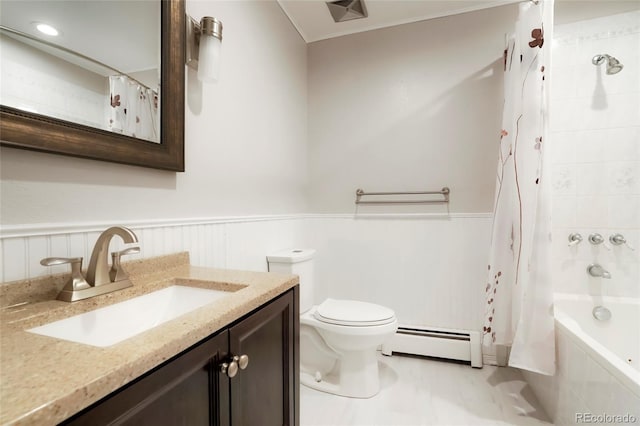8595 S Yarrow St, Littleton, CO 80128 - full bath featuring a baseboard radiator, shower / tub combo, vanity, and wainscoting