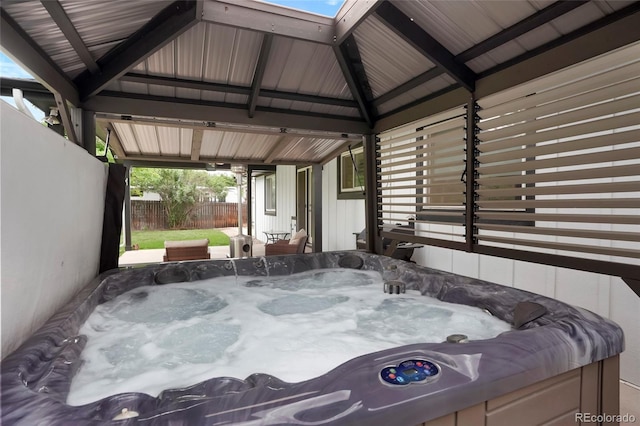 8595 S Yarrow St, Littleton, CO 80128 - view of patio with a hot tub and a gazebo