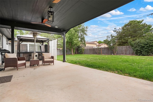 8595 S Yarrow St, Littleton, CO 80128 - fenced backyard with a gazebo and a patio