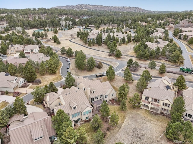 birds eye view of property with a residential view