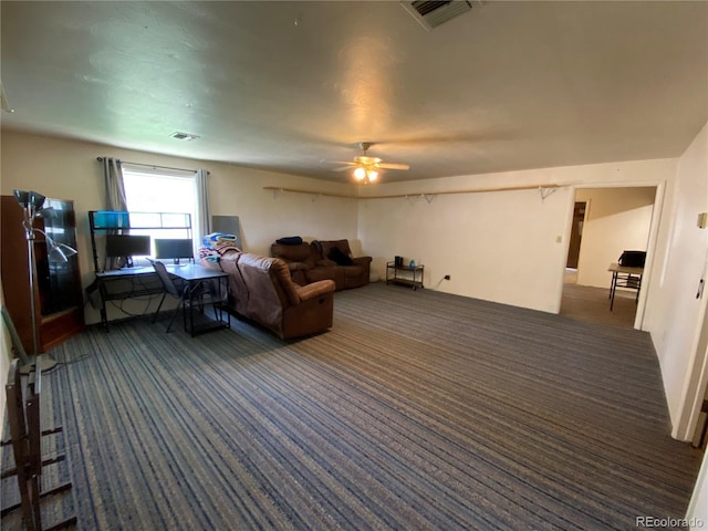 12729 Desert Dr, Sterling, CO 80751 - carpeted living room featuring a ceiling fan