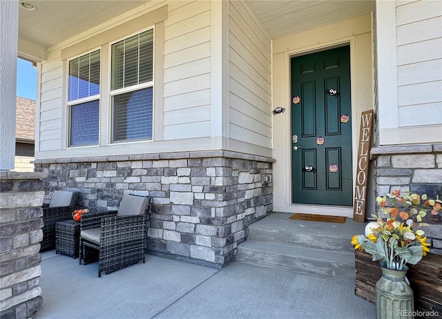 entrance to property with covered porch