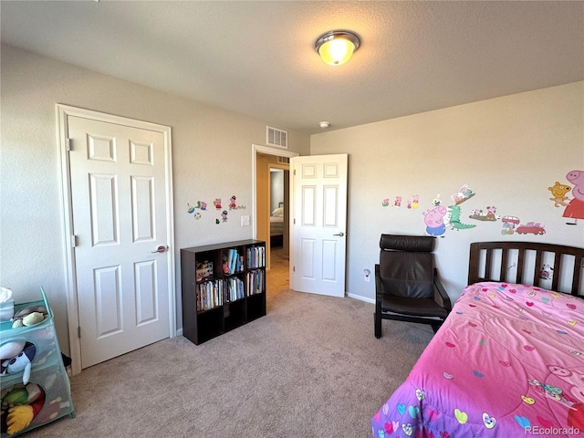 bedroom featuring carpet flooring