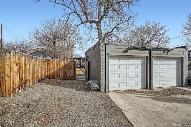 garage featuring fence