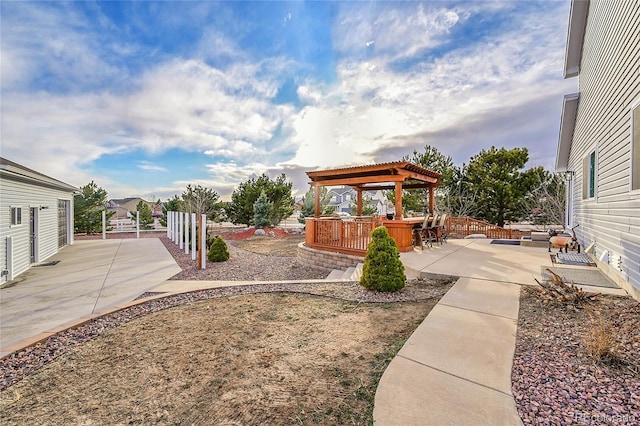 view of yard featuring a patio, a gazebo, and fence