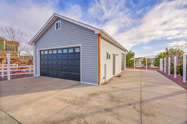 detached garage with fence