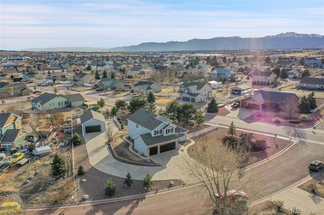 aerial view featuring a residential view and a mountain view