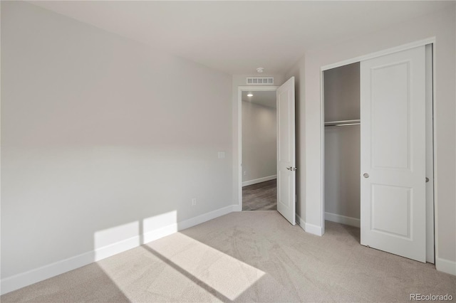 2143 Peralta Loop, Castle Rock, CO 80104 - unfurnished bedroom featuring light colored carpet, baseboards, and a closet