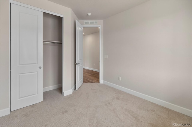 2143 Peralta Loop, Castle Rock, CO 80104 - unfurnished bedroom with carpet floors, baseboards, and a closet