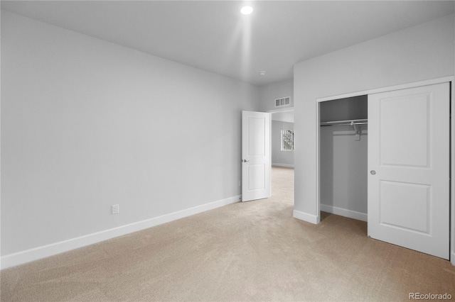 2143 Peralta Loop, Castle Rock, CO 80104 - unfurnished bedroom featuring light carpet, baseboards, and a closet