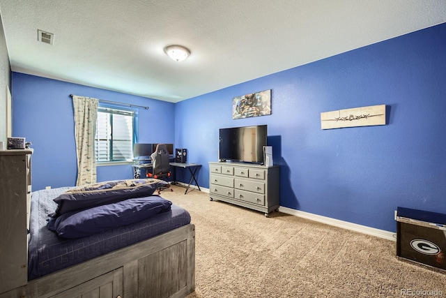 4866 Rainbow Gulch Trl, Colorado Springs, CO 80924 - bedroom featuring carpet flooring, an office area, baseboards, and a textured wall