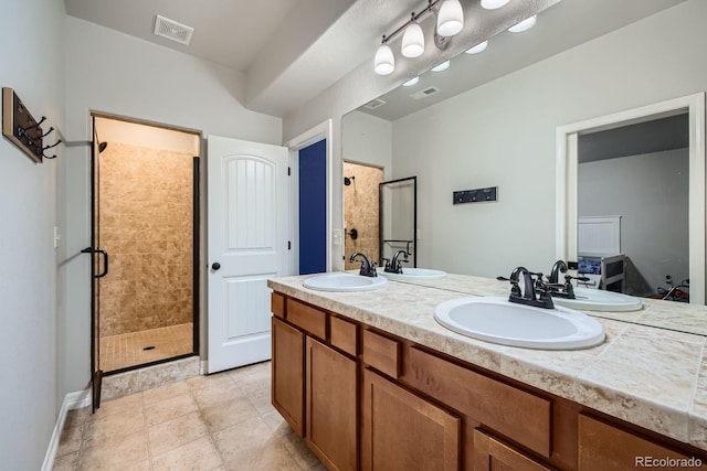 4866 Rainbow Gulch Trl, Colorado Springs, CO 80924 - full bath with a stall shower and double vanity
