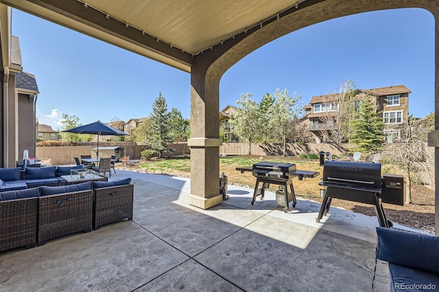 4866 Rainbow Gulch Trl, Colorado Springs, CO 80924 - view of patio with an outdoor living space, a fenced backyard, and outdoor dining area