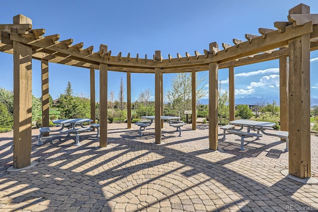 4866 Rainbow Gulch Trl, Colorado Springs, CO 80924 - view of patio / terrace featuring a pergola and outdoor dining area