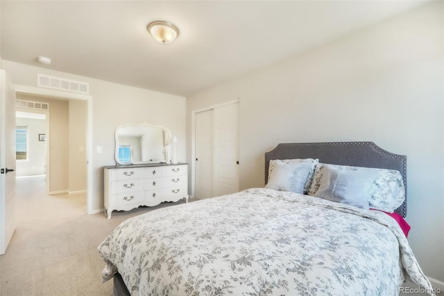9521 Sideoats Ct, Colorado Springs, CO 80927 - bedroom with light colored carpet, a closet, and baseboards