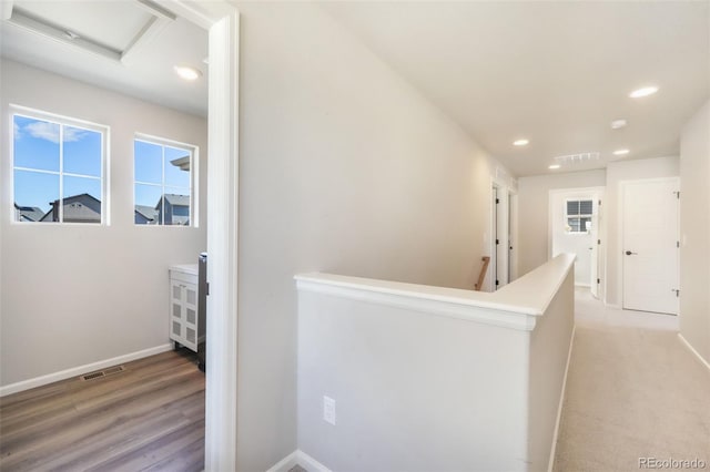 9521 Sideoats Ct, Colorado Springs, CO 80927 - hall featuring recessed lighting, an upstairs landing, attic access, baseboards, and light wood-style flooring