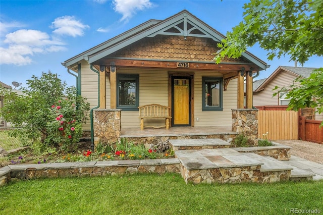 4716 Broadway, Denver, CO 80216 - view of front of home with a porch