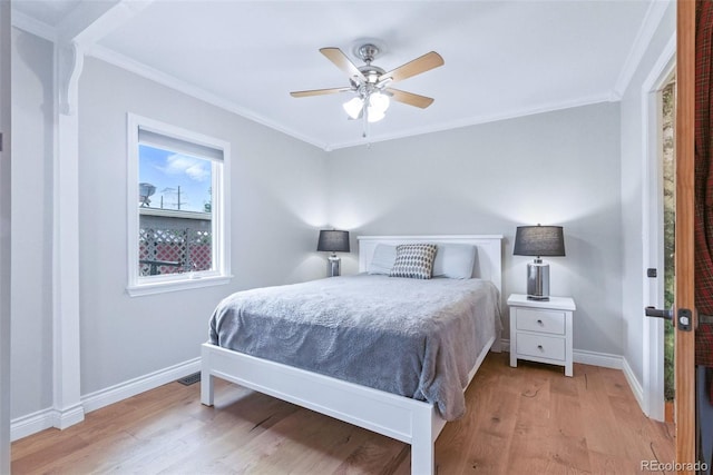4716 Broadway, Denver, CO 80216 - bedroom featuring wood finished floors, crown molding, and ceiling fan