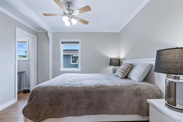 4716 Broadway, Denver, CO 80216 - bedroom featuring crown molding, light wood-style floors, and ceiling fan
