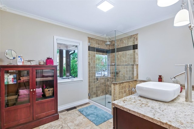 4716 Broadway, Denver, CO 80216 - bathroom with vanity, a stall shower, crown molding, and tile patterned floors