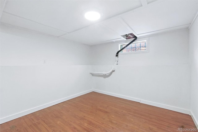 4716 Broadway, Denver, CO 80216 - basement featuring baseboards and wood finished floors