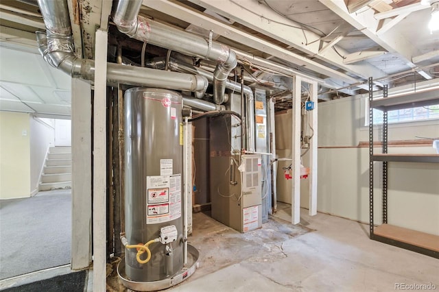 4716 Broadway, Denver, CO 80216 - basement featuring gas water heater, stairway, and heating unit