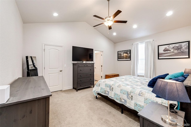 carpeted bedroom with vaulted ceiling and ceiling fan