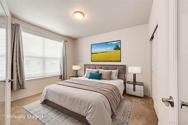 56459 E 23rd Pl, Strasburg, CO 80136 - bedroom with carpet and baseboards