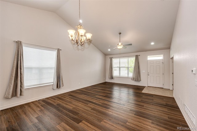 56459 E 23rd Pl, Strasburg, CO 80136 - unfurnished room with lofted ceiling, a chandelier, dark wood-style floors, a ceiling fan, and recessed lighting