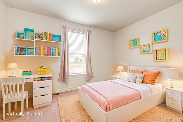 56459 E 23rd Pl, Strasburg, CO 80136 - bedroom featuring light carpet and baseboards