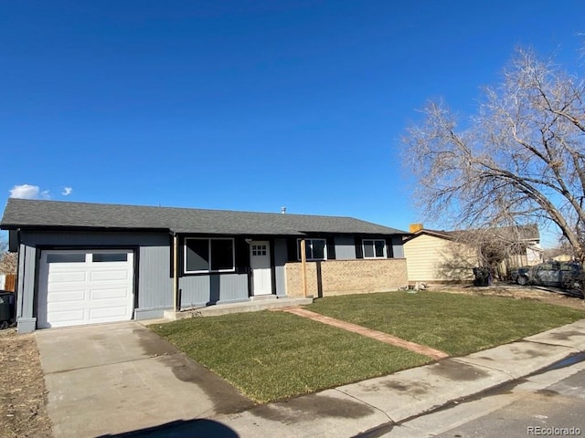 ranch-style house with a front yard and a garage