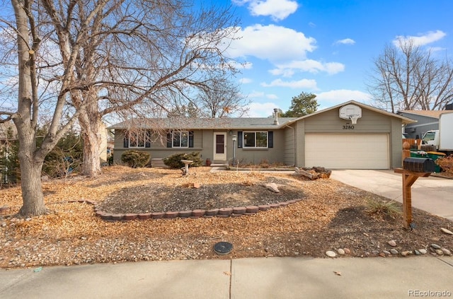 ranch-style home featuring a garage