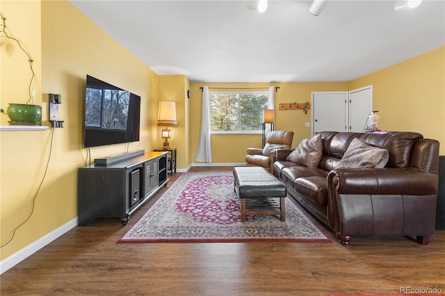 living room with dark hardwood / wood-style floors