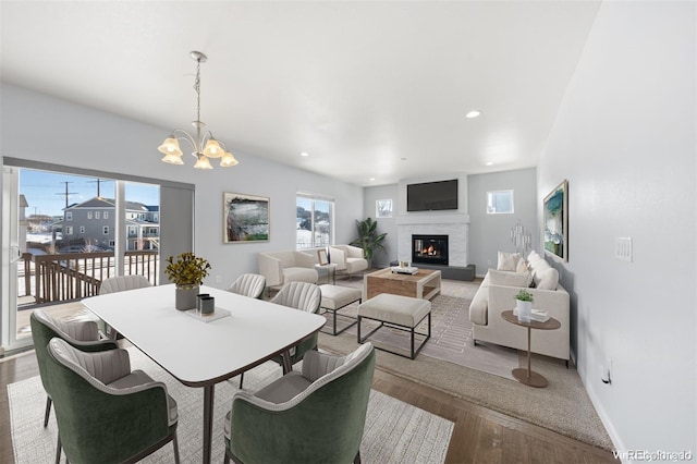 dining room featuring hardwood / wood-style flooring and a notable chandelier