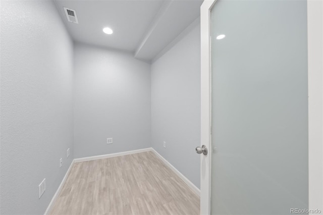 empty room with light wood-type flooring