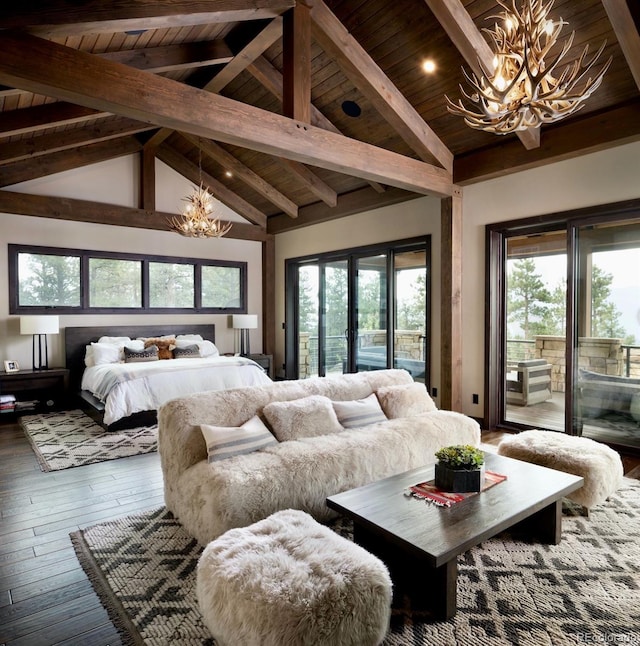 bedroom featuring beam ceiling, multiple windows, a chandelier, and access to outside