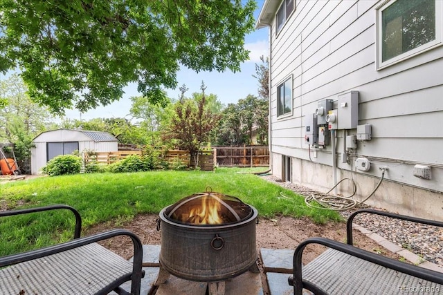 915 Mercury Cir, Littleton, CO 80124 - view of yard featuring an outdoor fire pit and a patio area