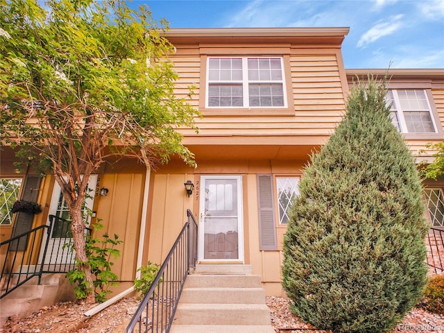 2627 E Nichols Cir, Centennial, CO 80122 - view of front of home with board and batten siding