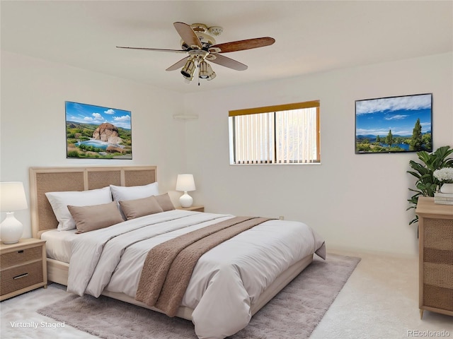 390 Zang St Unit 5-102, Lakewood, CO 80228 - bedroom with light colored carpet and ceiling fan