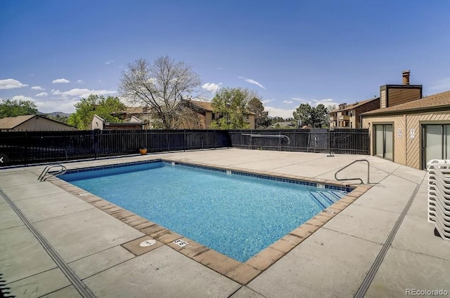 390 Zang St Unit 5-102, Lakewood, CO 80228 - view of swimming pool featuring a patio