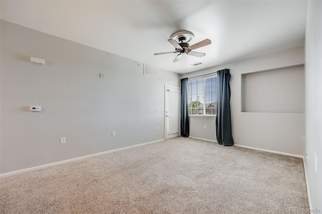 2672 S Cathay Way Unit 304, Aurora, CO 80013 - empty room with ceiling fan, carpet flooring, and baseboards