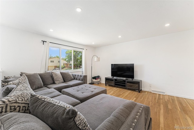 9265 Newton St, Westminster, CO 80031 - living room featuring light wood-style floors and recessed lighting