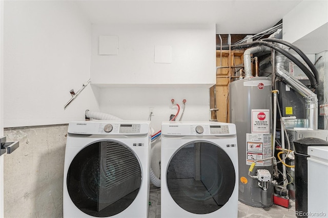 9265 Newton St, Westminster, CO 80031 - washroom with water heater and separate washer and dryer