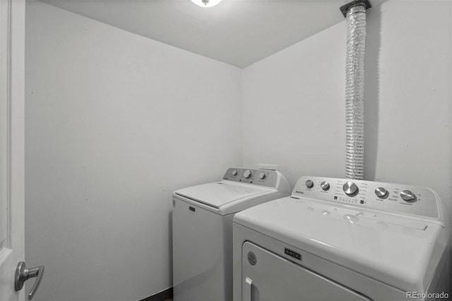 laundry room featuring washer and clothes dryer