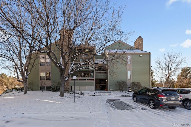 view of snow covered property