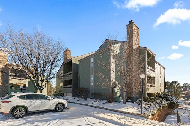 view of snow covered property