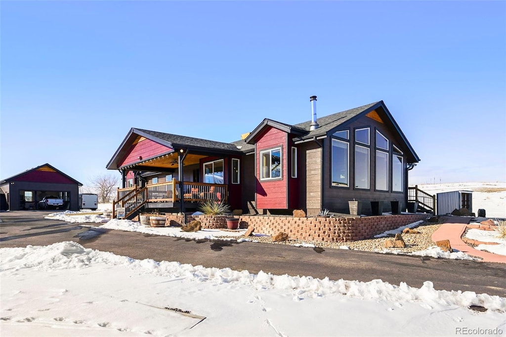 view of front of property featuring covered porch